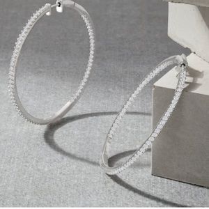 2.00ct. t.w. Diamond inside-outside Sterling Silver hoop earrings.